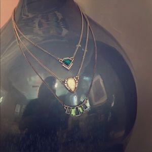 Green stone three layered necklace.